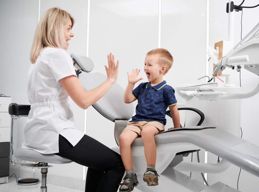 young boy at dentist